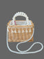 Woven straw basket purse with fringe accent and pearl handles