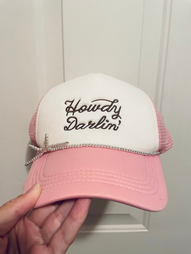 Howdy Darlin’ pink trucker hat with pearl bow accent Hover Image